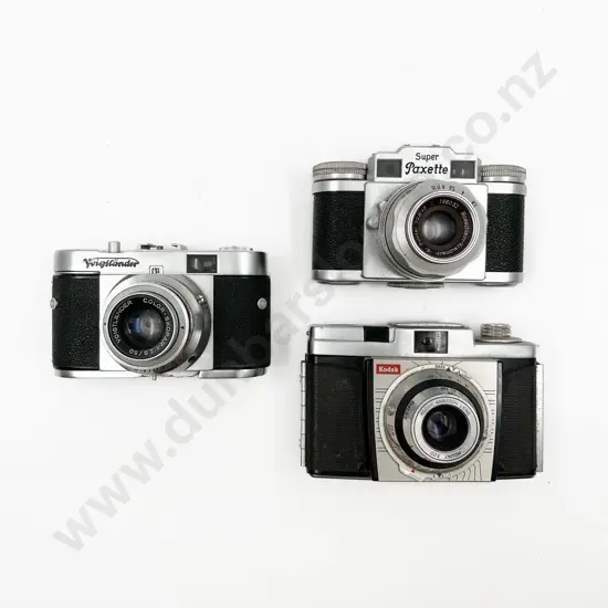 Three Rangefinder Film Cameras with Leather Cases