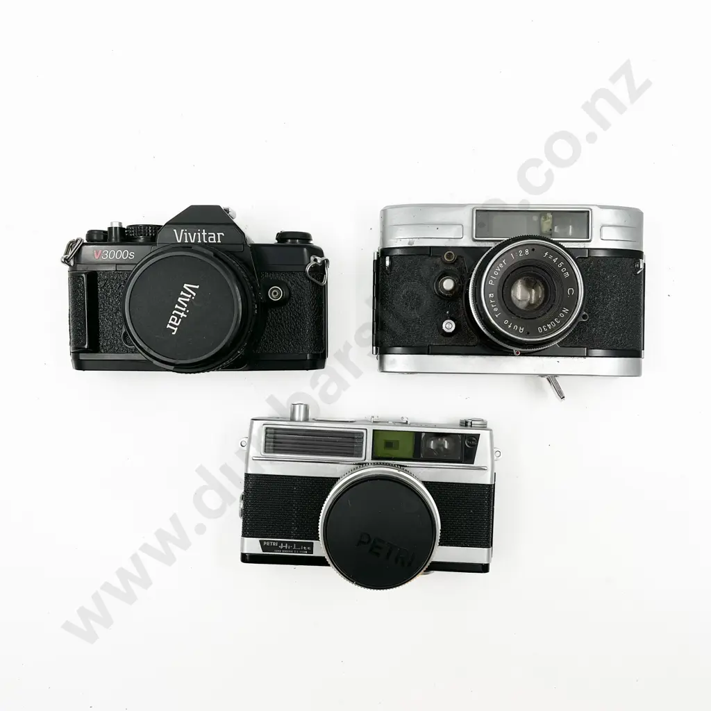 Three Rangefinder Film Cameras with Leather Cases Image 1++