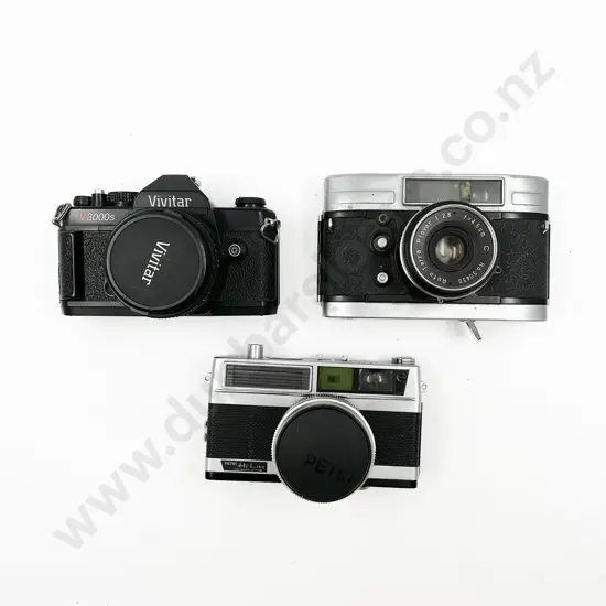 Three Rangefinder Film Cameras with Leather Cases