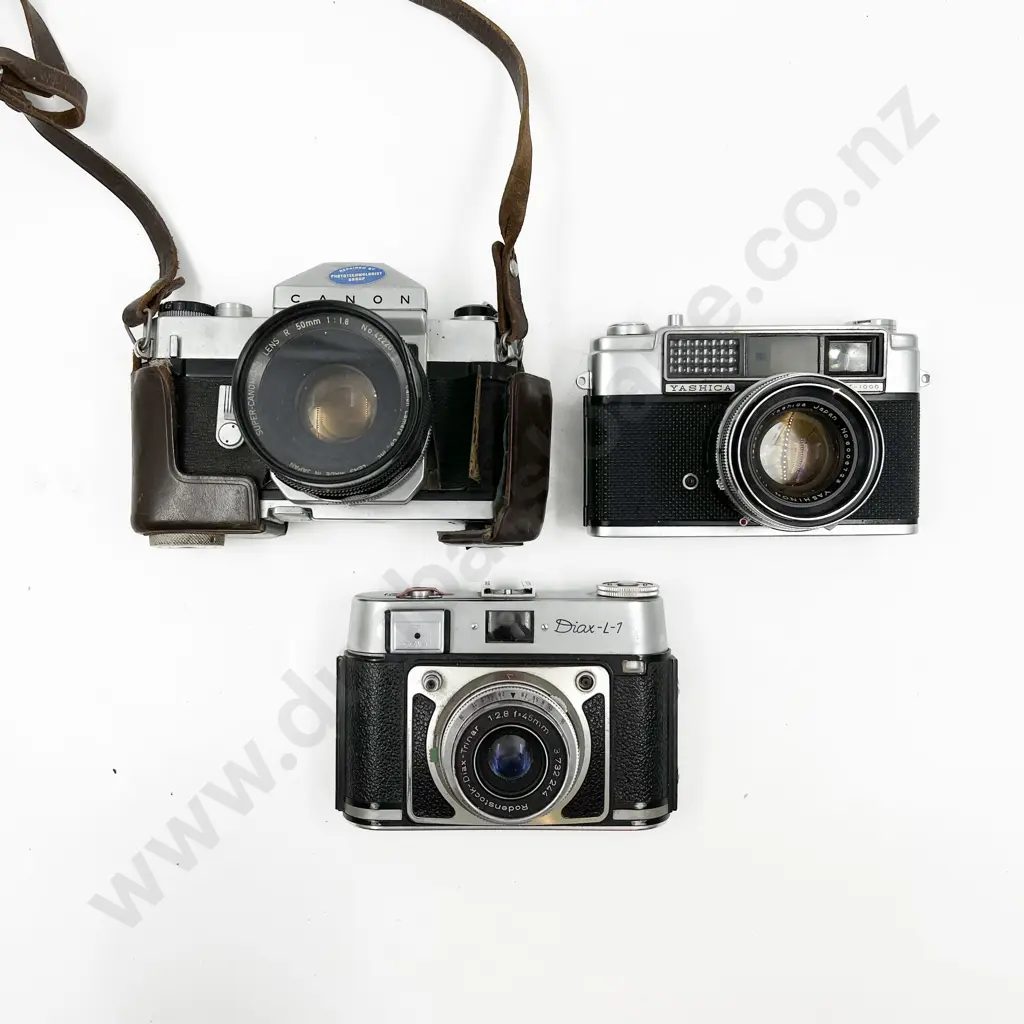 Two Rangefinder & One SLR Film Cameras with Leather Cases Image 1++