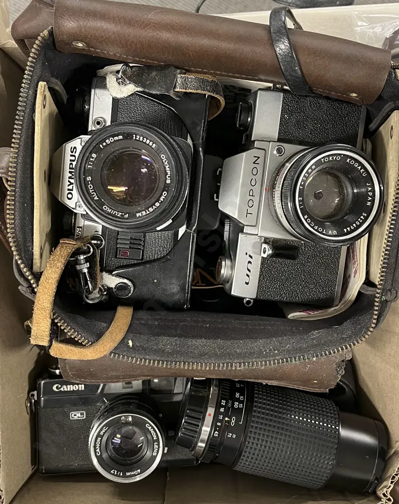 Three Cameras Including Olympus OM 10 with Camera Bag and Accessories Image 1++
