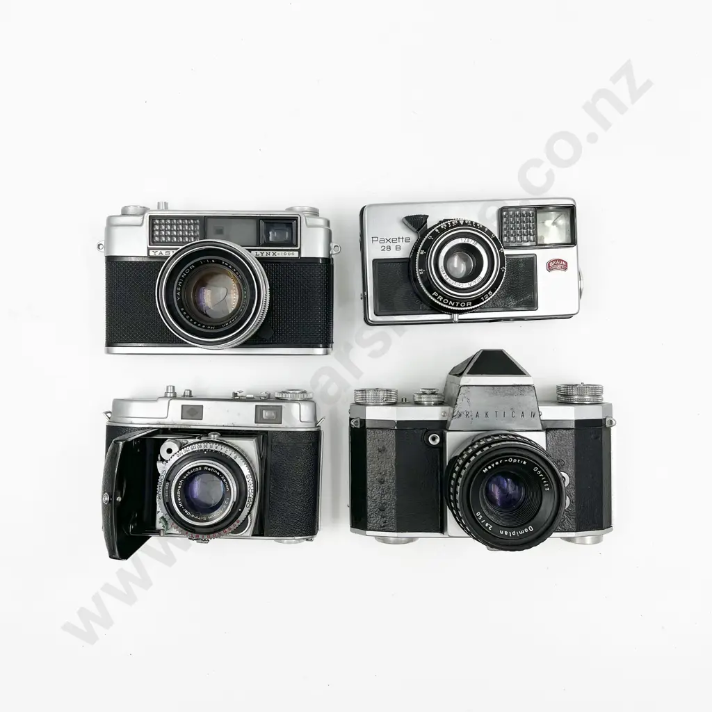 Three Various Cased Cameras with Praktica IV Image 1++