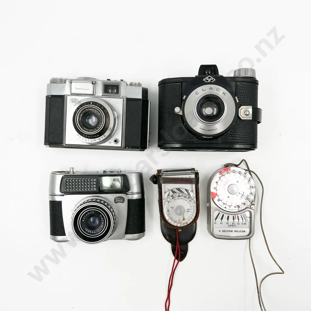 Three Cased Cameras with Two Light Meters Image 1++