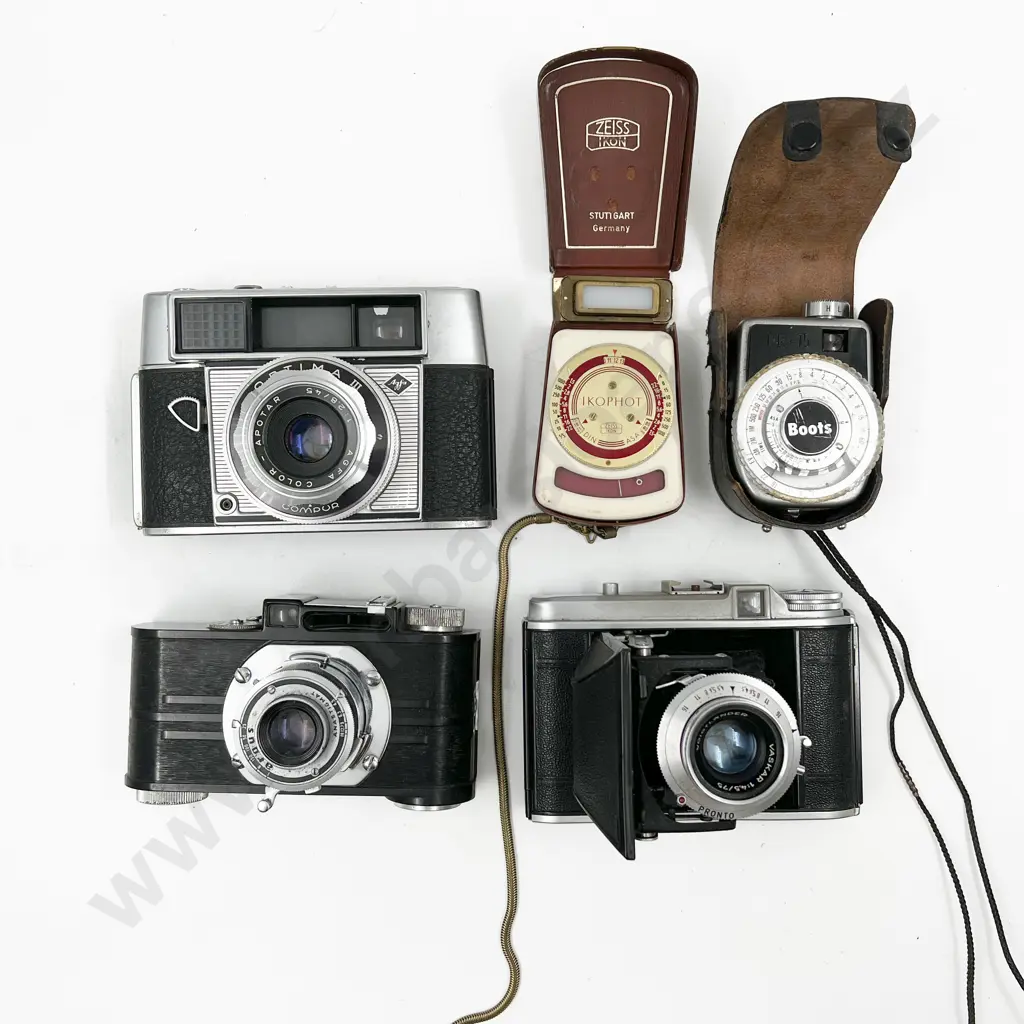 Three Cased Cameras with Two Light Meters Image 1++