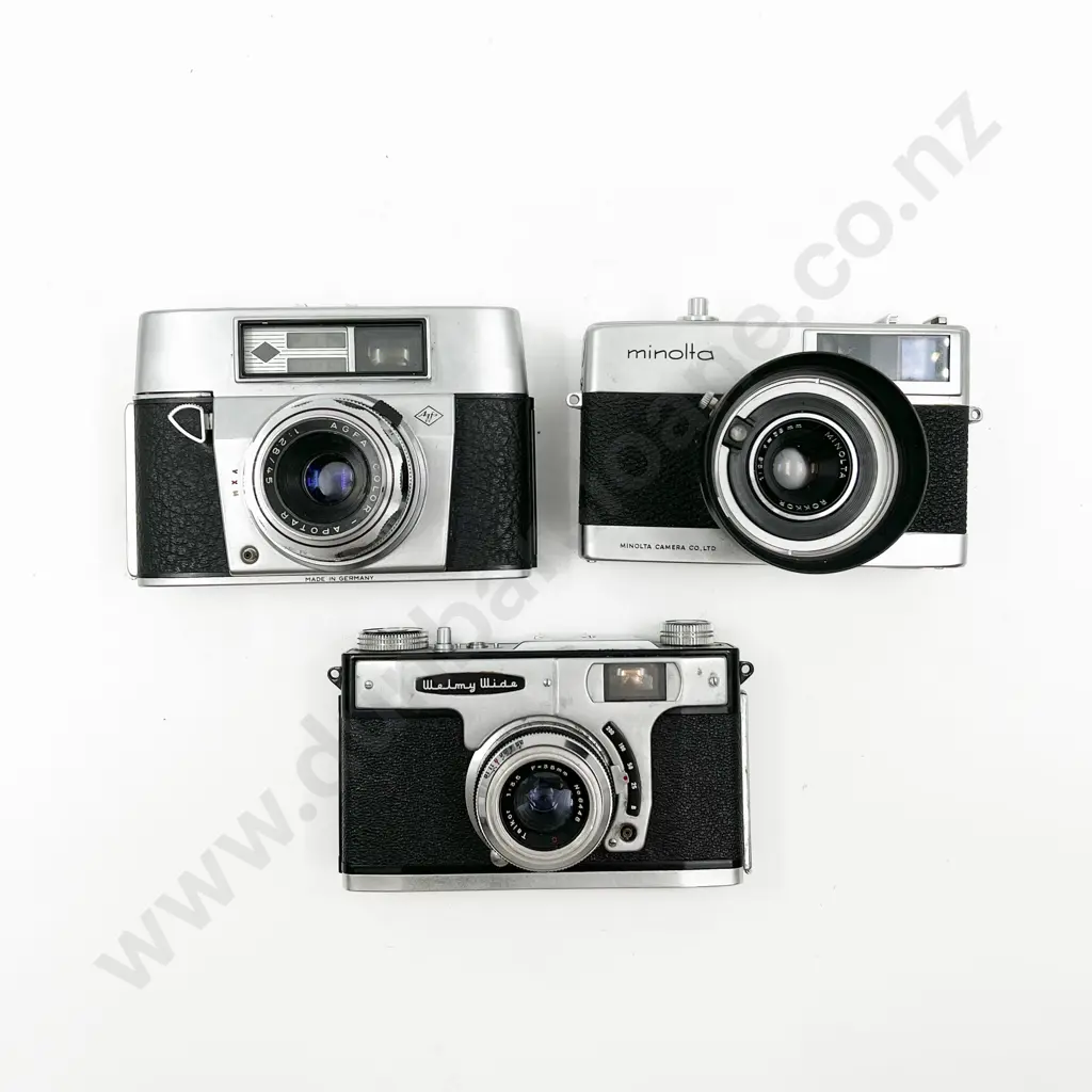 Three Cased Cameras Image 1++