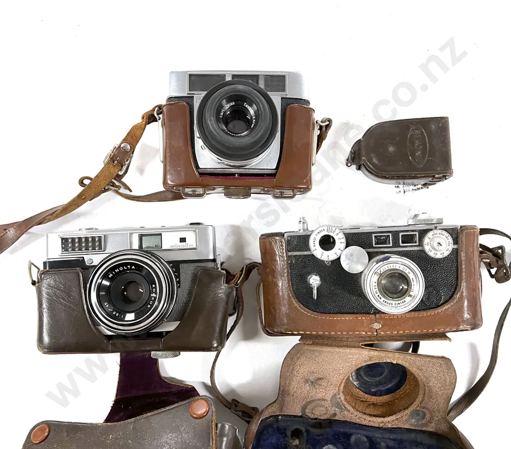 Three Cased Cameras with Two Light Meters Image 1++