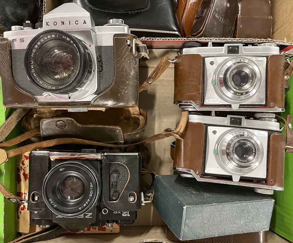 Four Cased Cameras Including Three Light Meters Image 1++