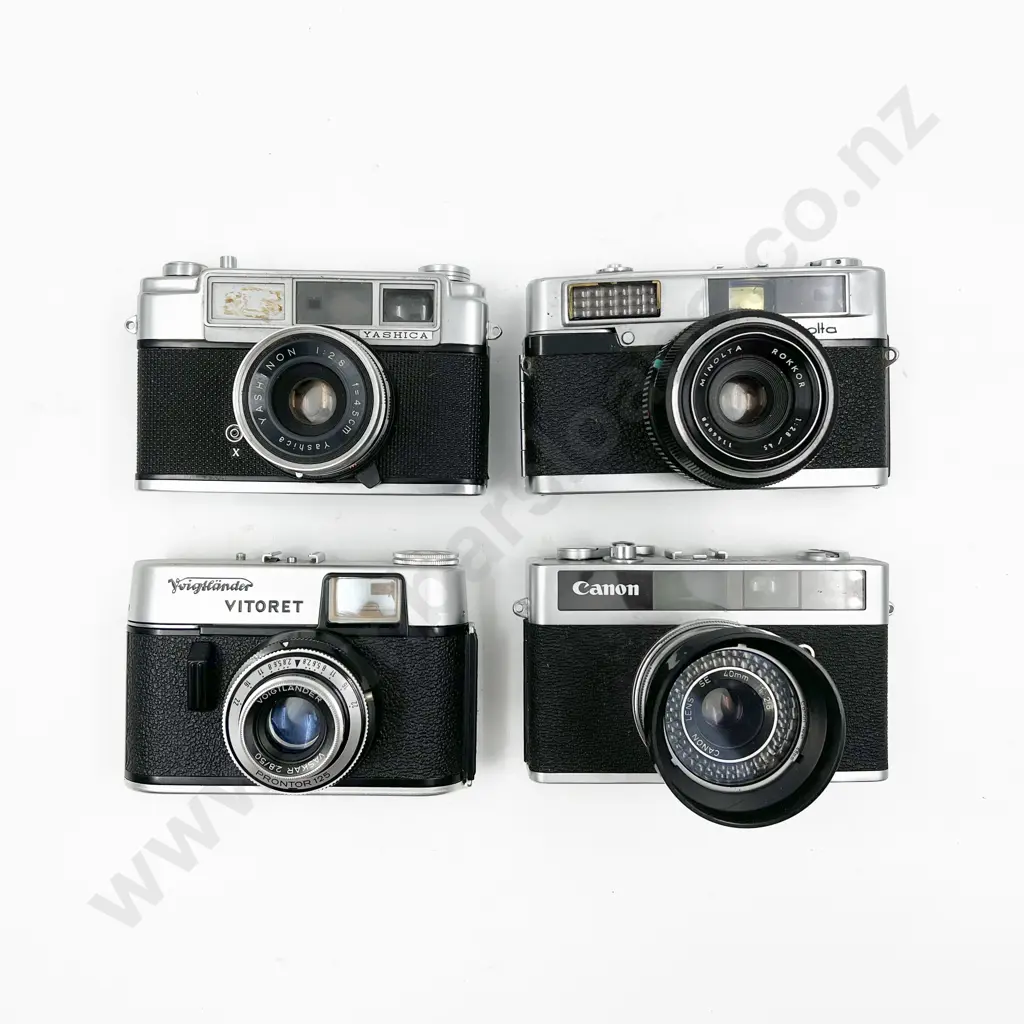 Four Assorted Cameras Image 1++