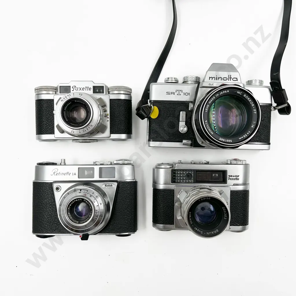 Four Assorted Cameras Image 1++