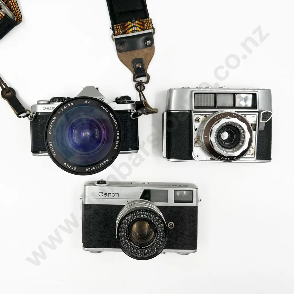 Three Assorted Cameras Image 1++