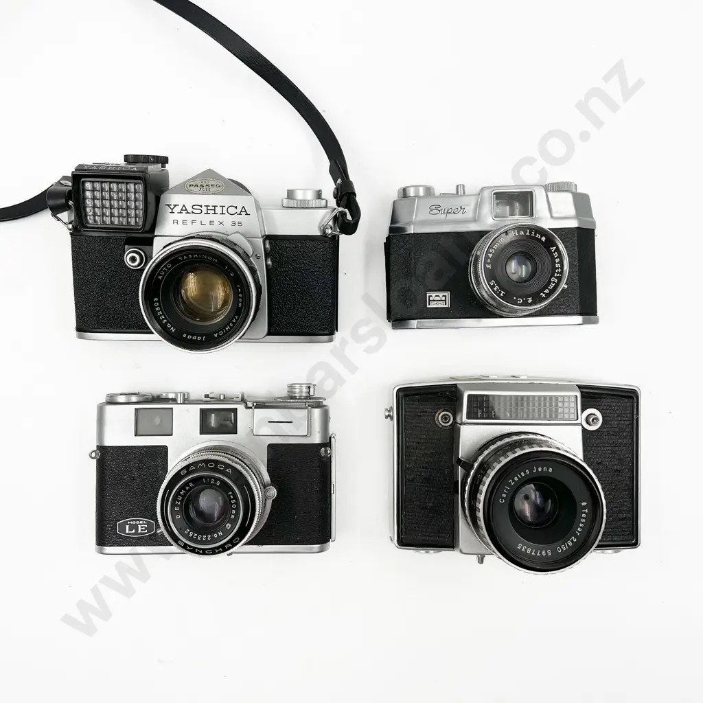 Four Assorted Cameras Image 1++