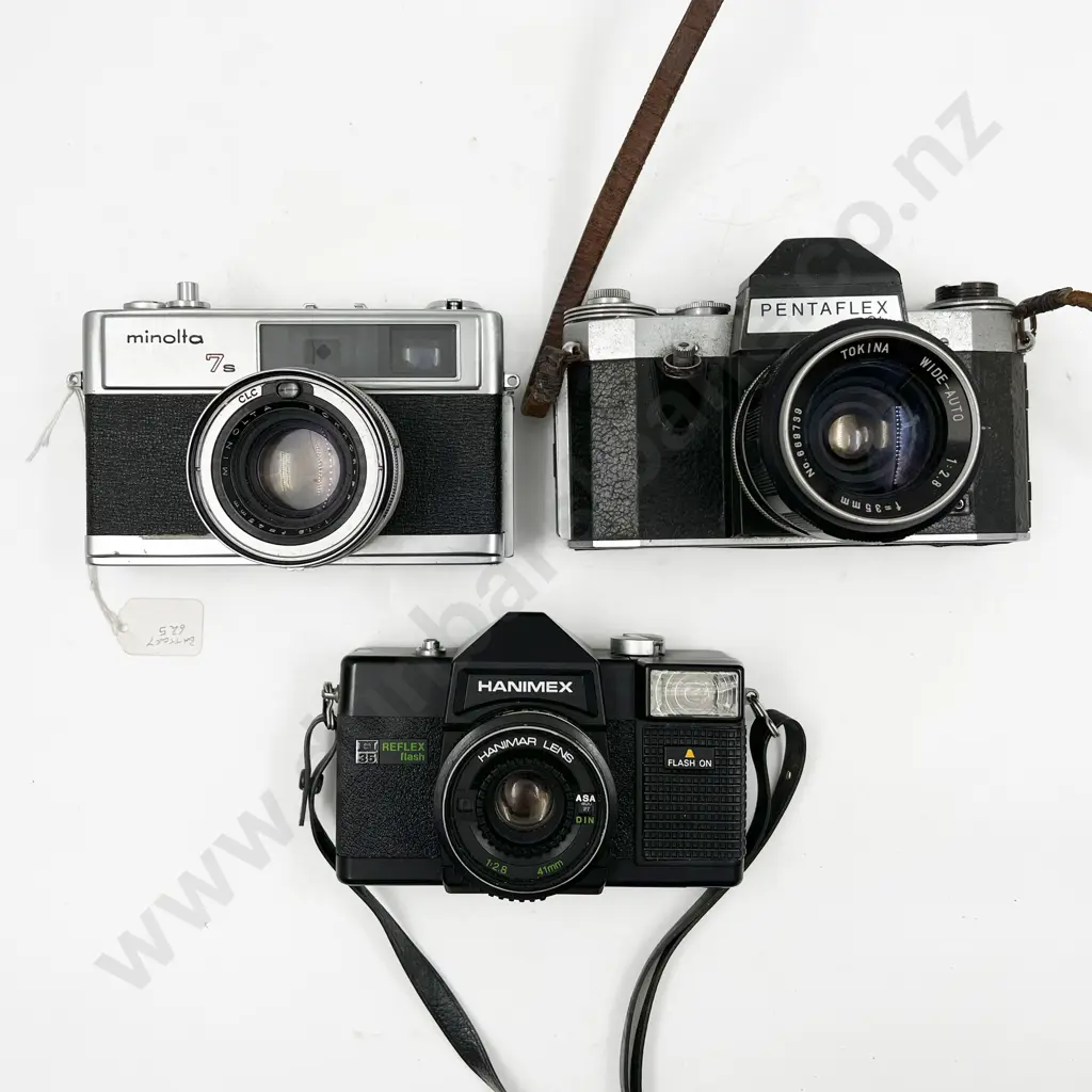 Three Assorted Cameras Image 1++