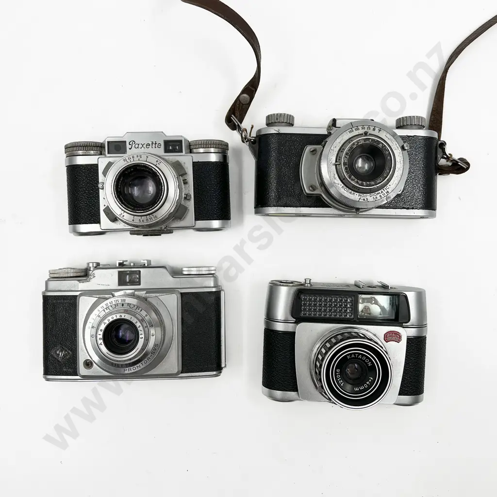 Four Assorted Cameras Image 1++