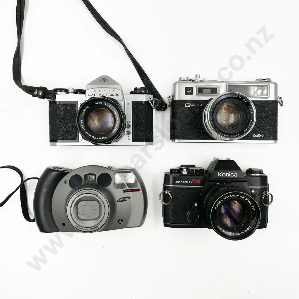 Four Assorted Cameras Image 1++
