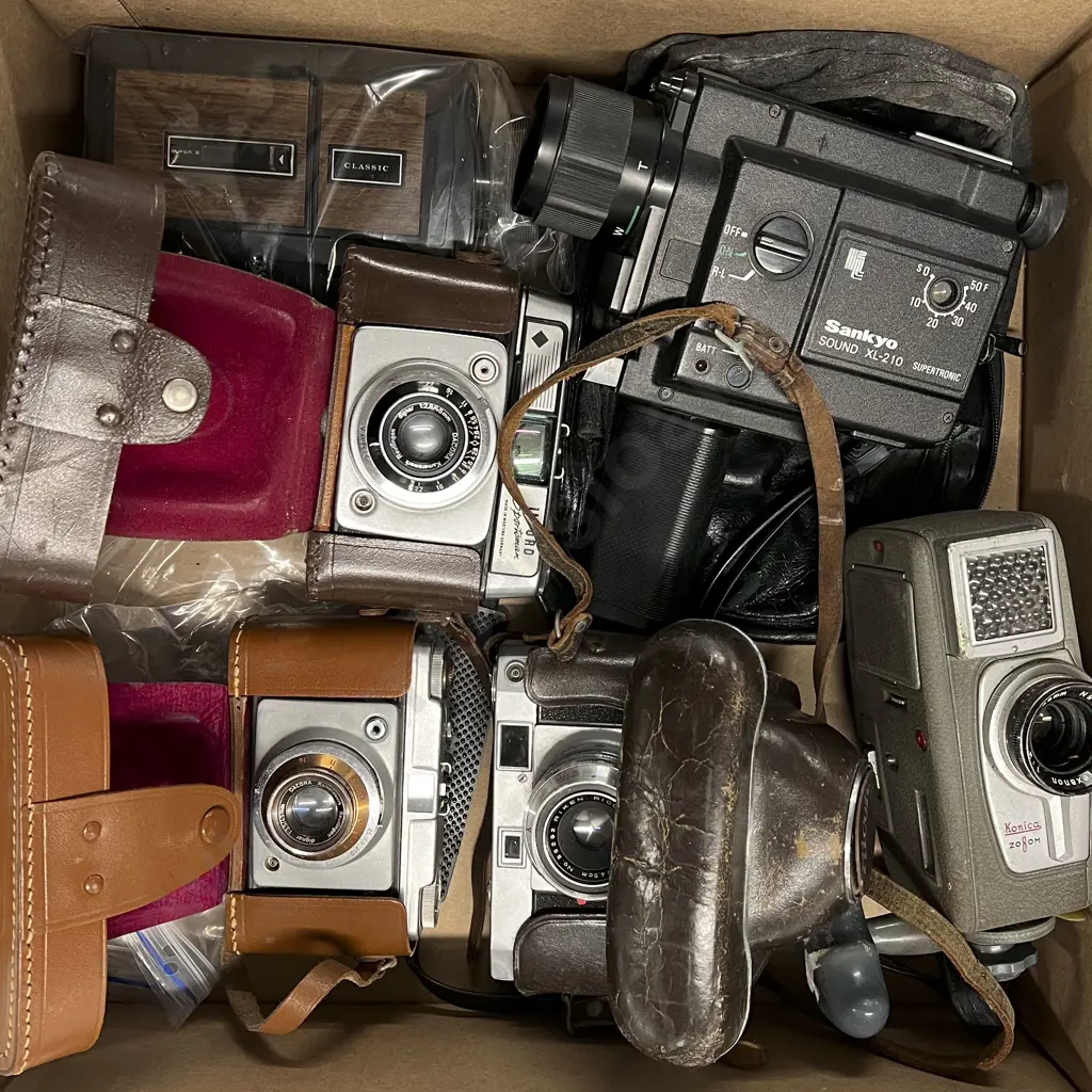 Three Various Film Cameras with Three Cased Cameras Image 1++