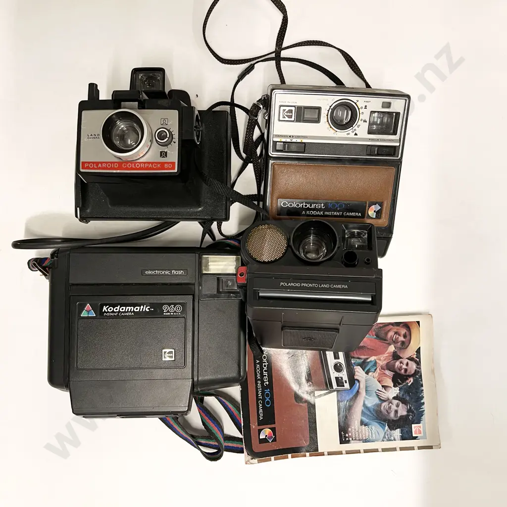 Four Various Instant Cameras Image 1++