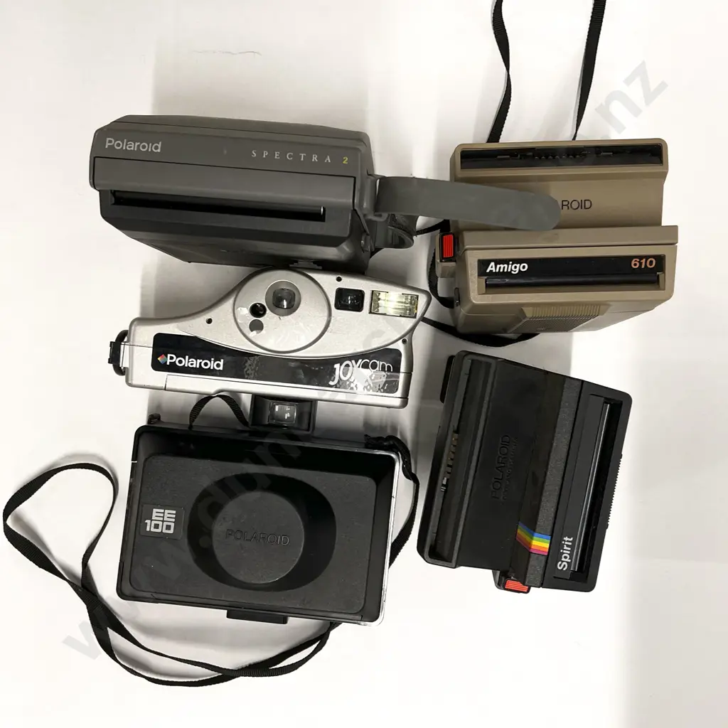 Five Various Instant Cameras Image 1++