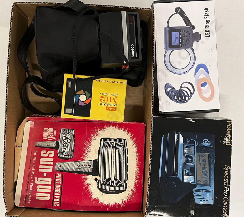 Assorted Quantity of Camera Accessories with Polaroids Image 1++