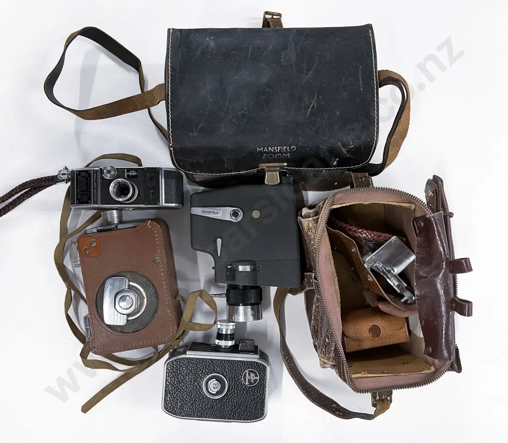 Four Small Cased Movie Cameras Including Kodak Brownie and Pillard Bolex Image 1++