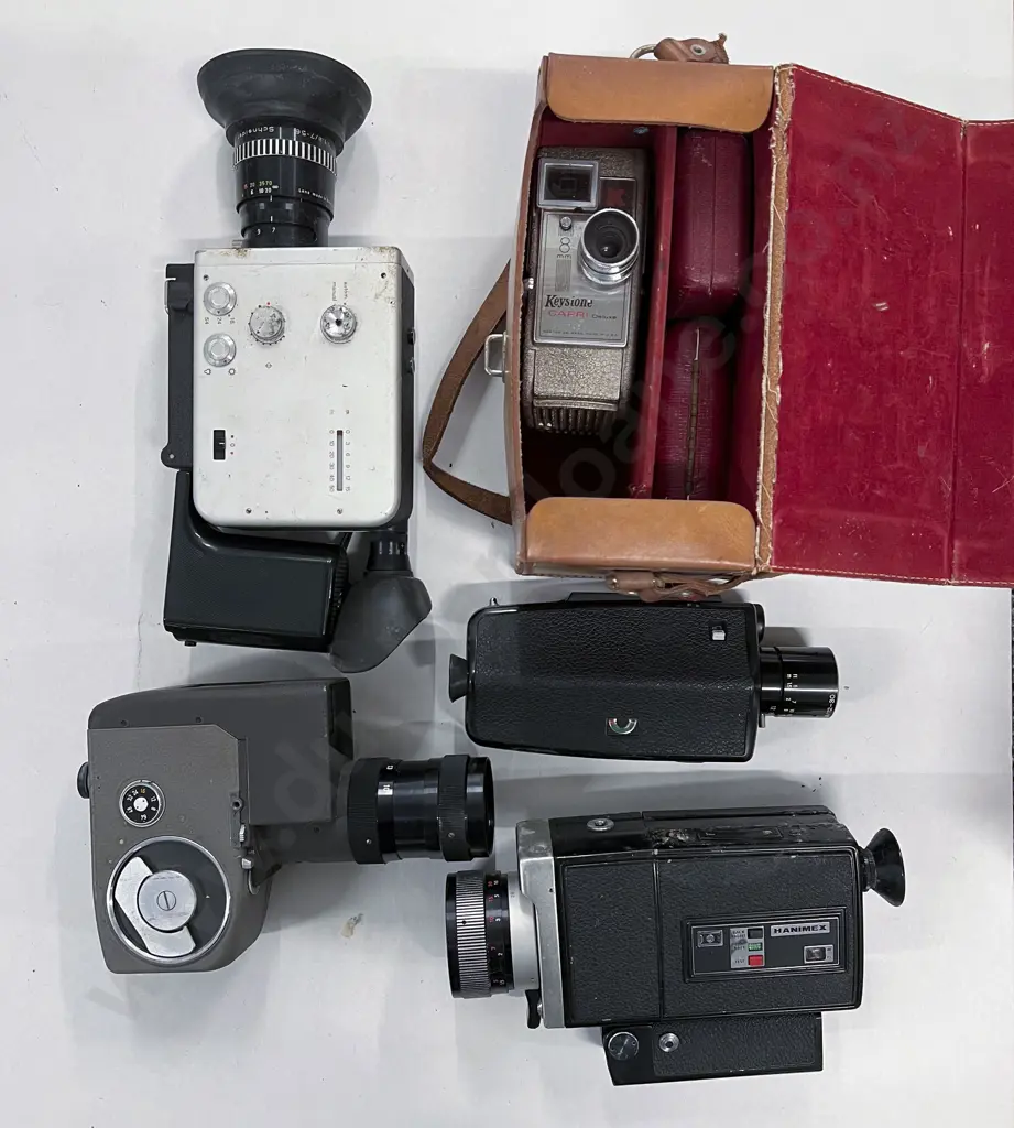 Five Movie Cameras Including Two Cased with Accessories Image 1++