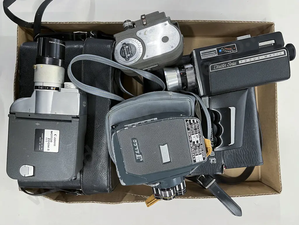 Three Cased Movie Cameras with Cinemaster II Model G-8 Image 1++