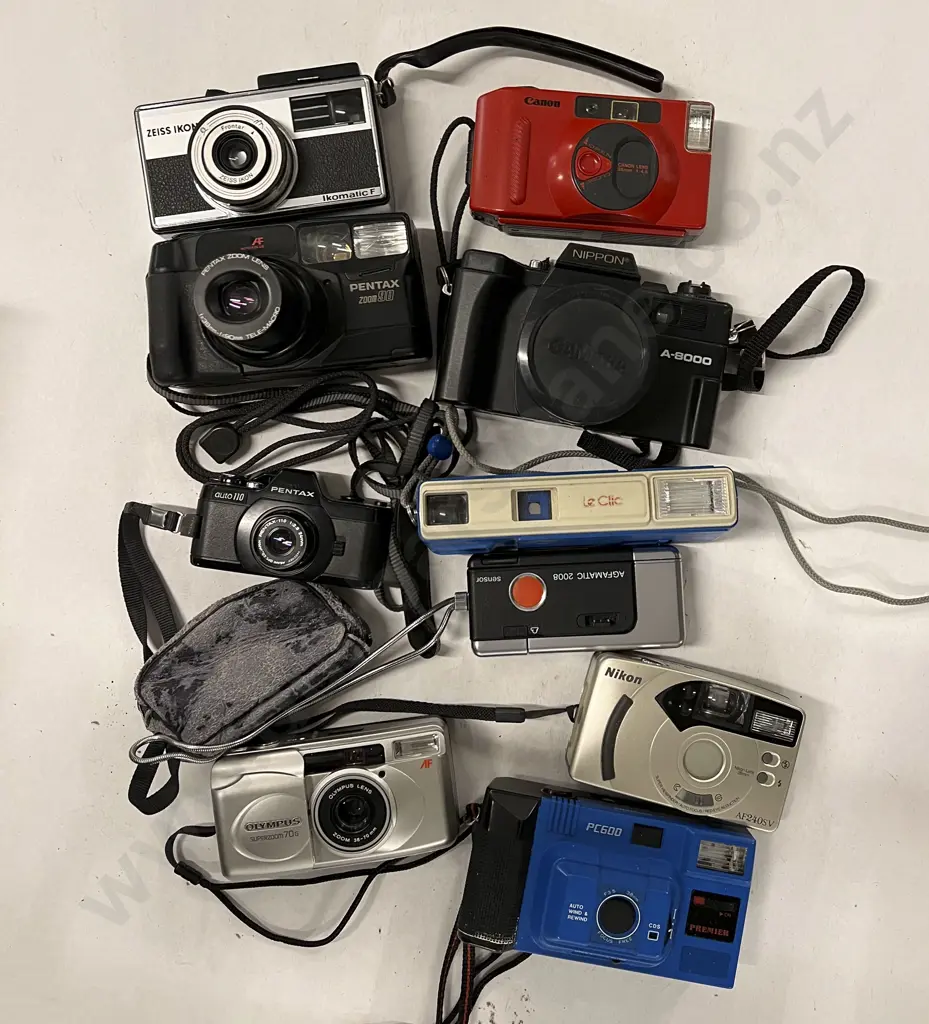 Quantity of Assorted Pocket Cameras and Others Image 1++