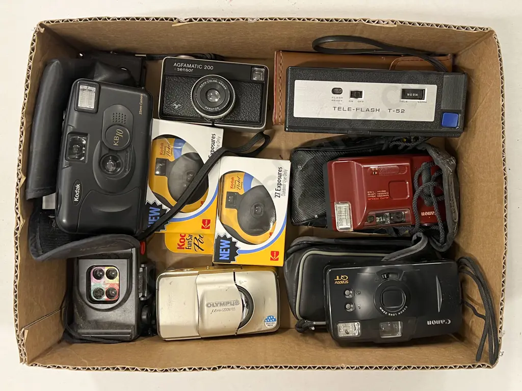 Quantity of Assorted Pocket Cameras Including Two Disposables Image 1++