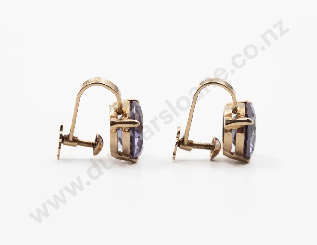 Pair 18ct Single Corundum Variety (Purple Sapphire) Stud Earrings Image 1++