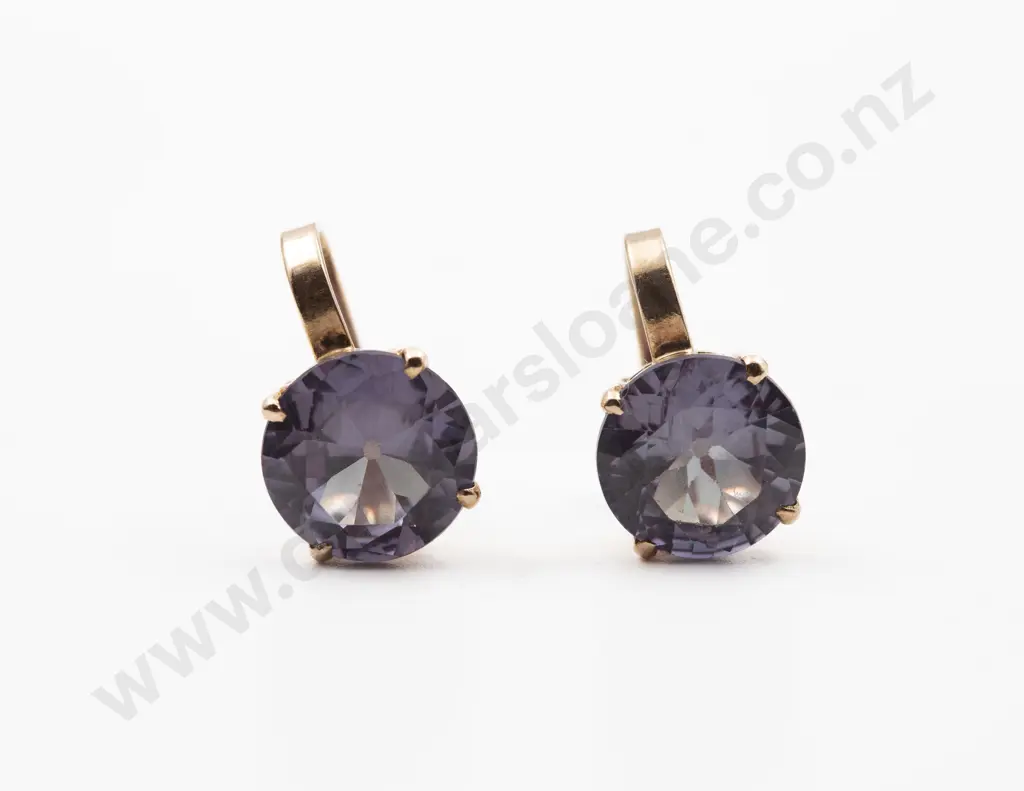 Pair 18ct Single Corundum Variety (Purple Sapphire) Stud Earrings Image 1++