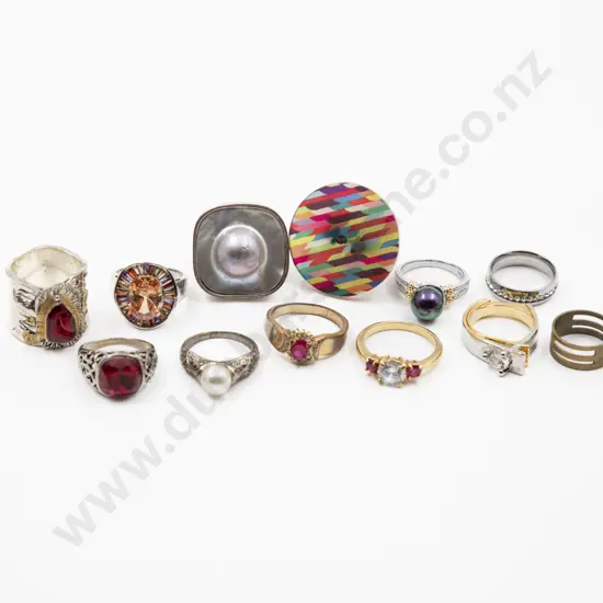 Twelve Costume Dress Rings and five pair earrings