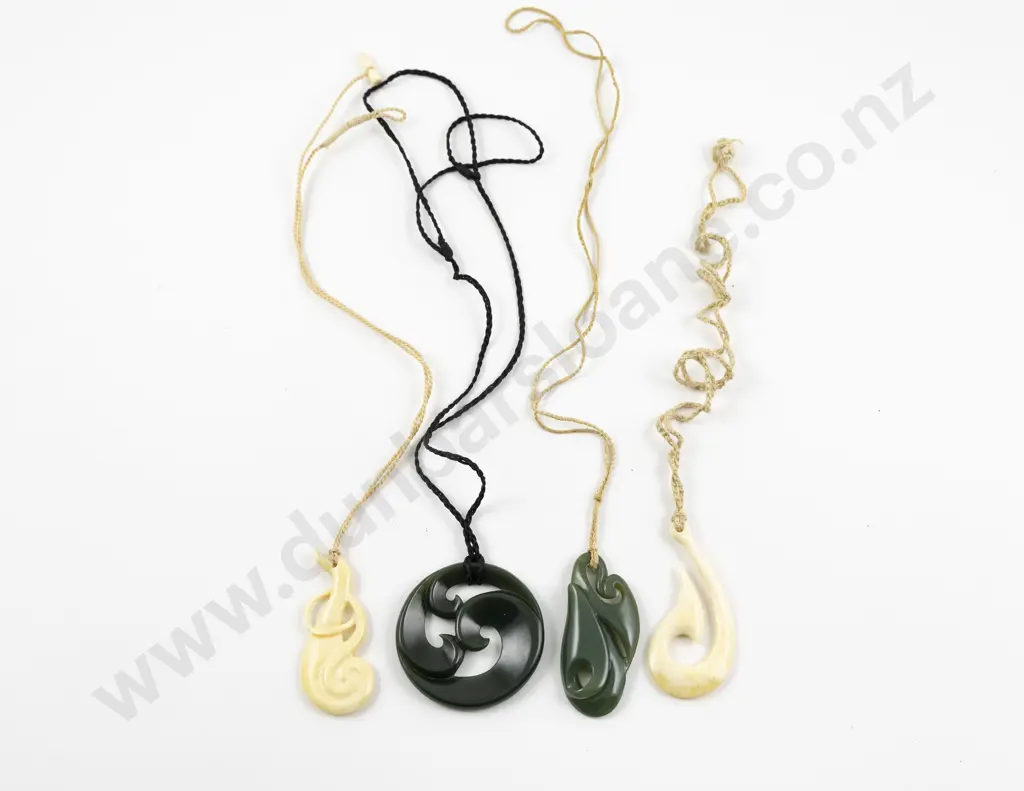 Maori Design Two Greenstone and Two Bone Pendants Image 1++
