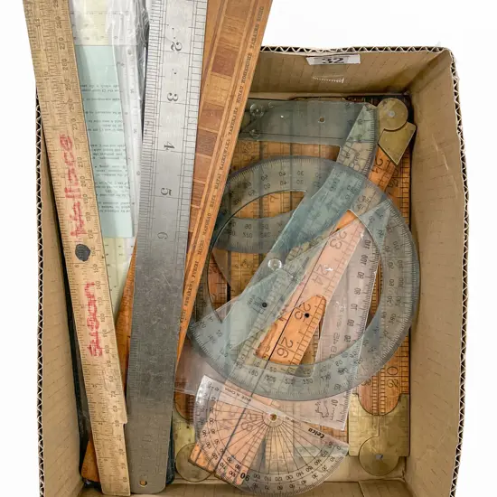 Box with Assorted Rulers including Five Folding Boxwood Examples