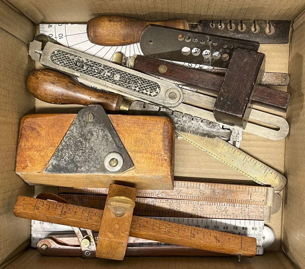 Box of Tools Including Folder Rulers Image 1++