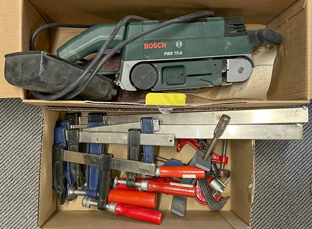 Bosch Belt Sander & Box of Assorted Steel Clamps Image 1++