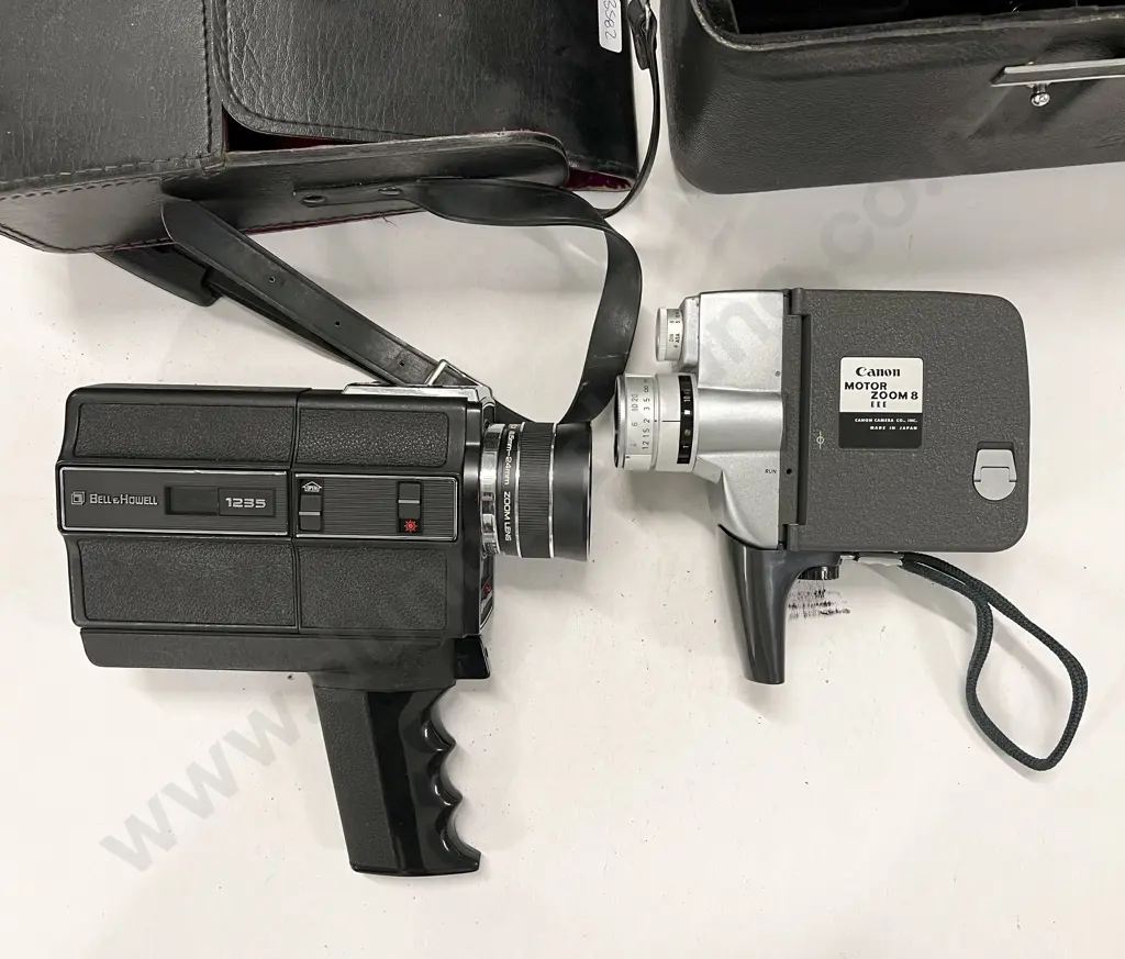 Two Cased Movie Cameras with Assortment of Slide Projector Items Image 1++
