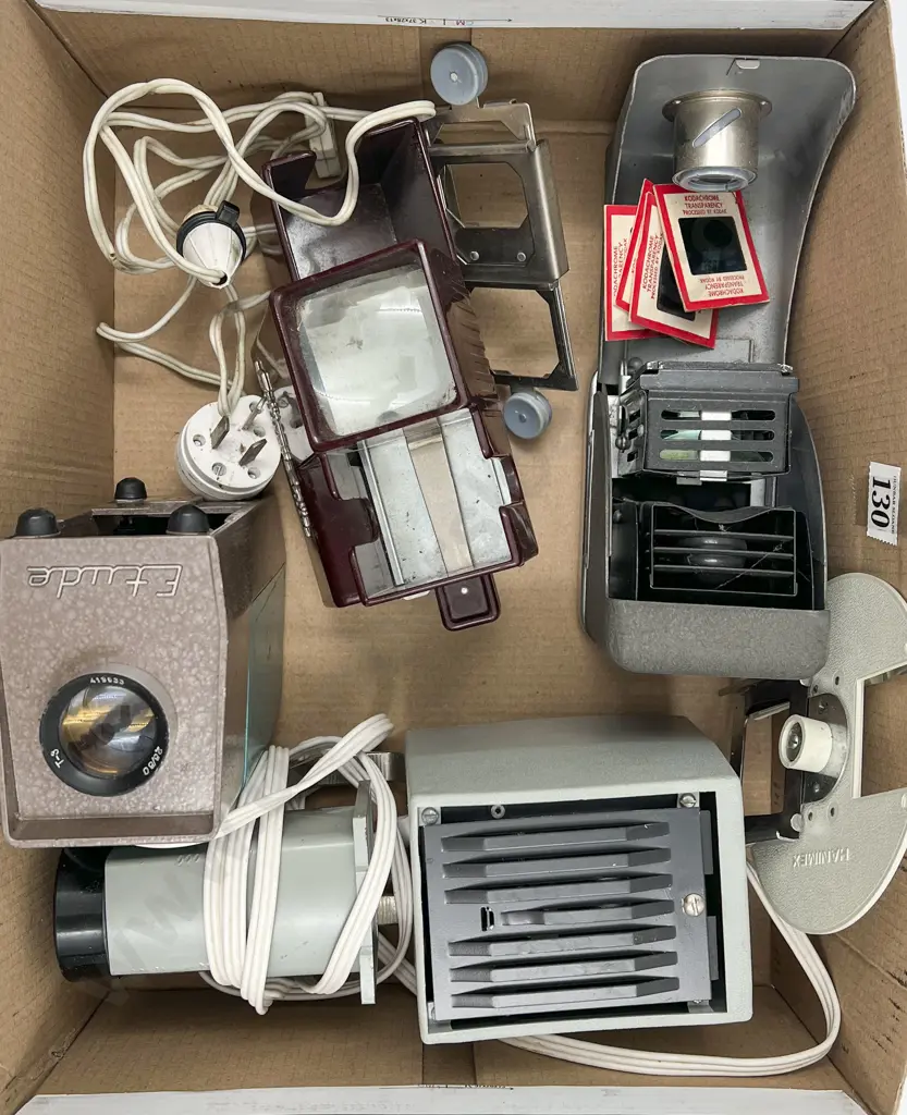 Two Cased Movie Cameras with Assortment of Slide Projector Items Image 1++