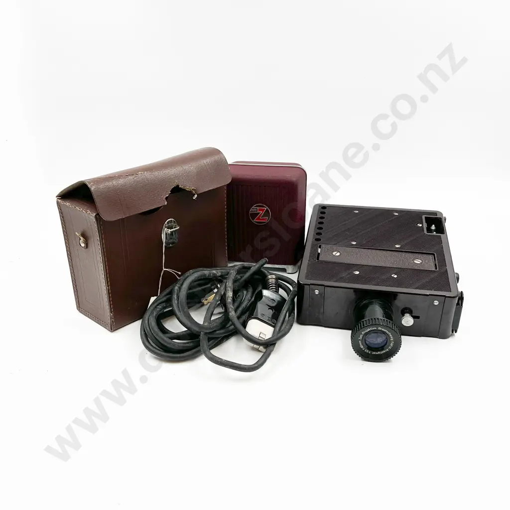 Two Projectors with Assortment of Various Lenses and Accessories Image 1++
