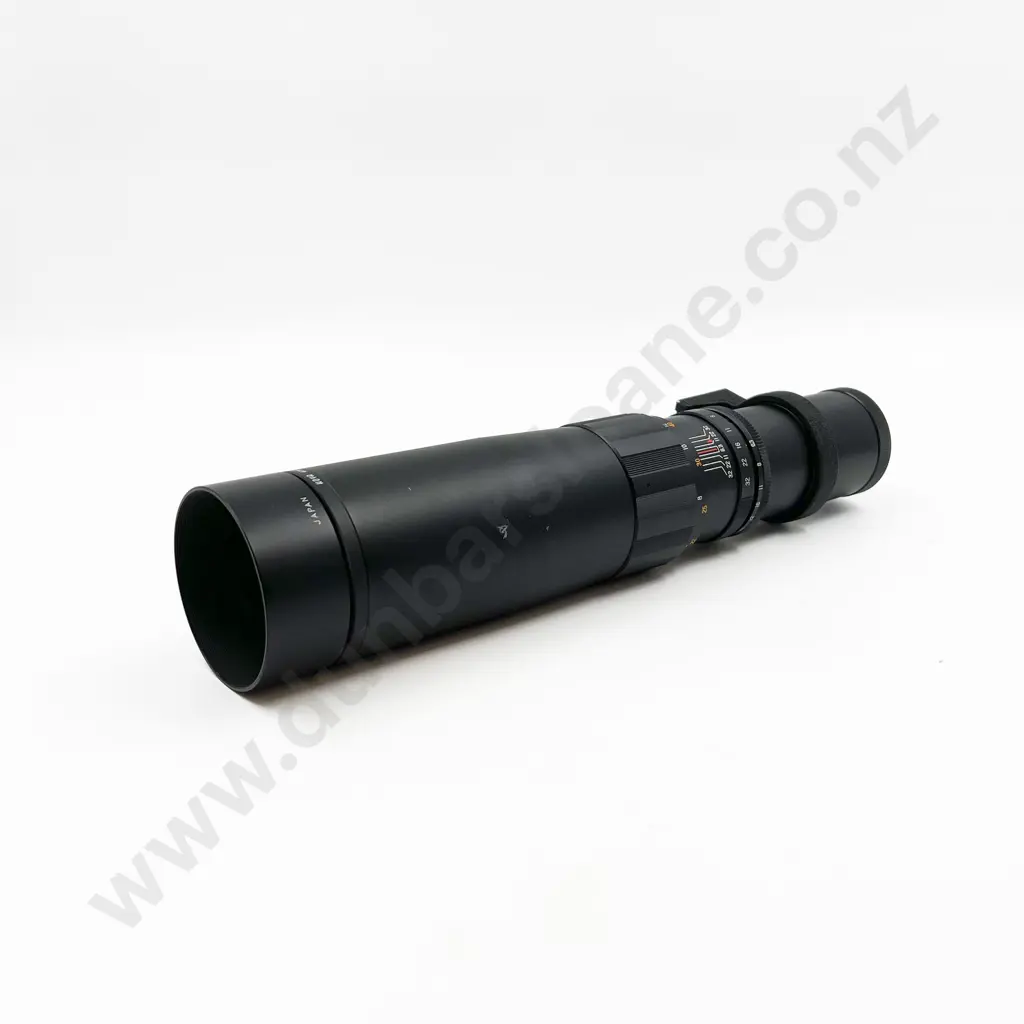 Two Lenses with Assorted Camera Accessories Image 1++
