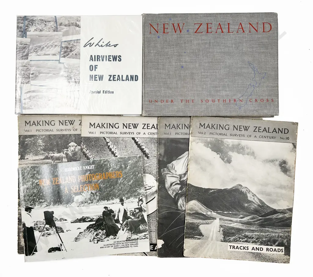 Three Books including 'White's Airviews of New Zealand' and Box of Pictorial Magazines Image 1++