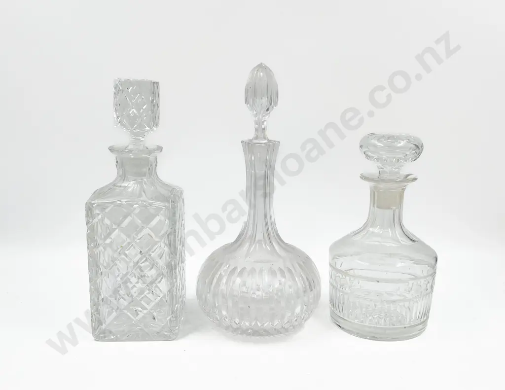 Three Assorted Crystal Decanters Image 1++