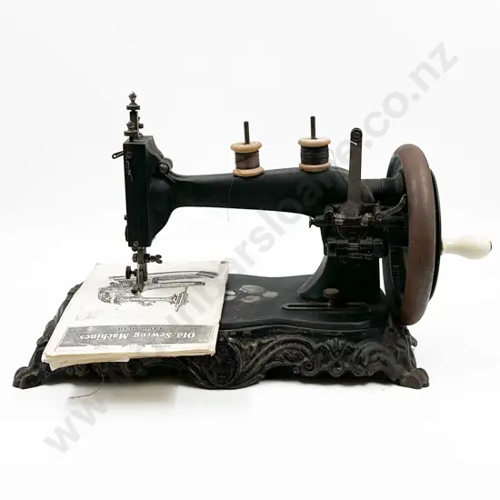 Vintage Sewing Machine on Wrought Metal Base