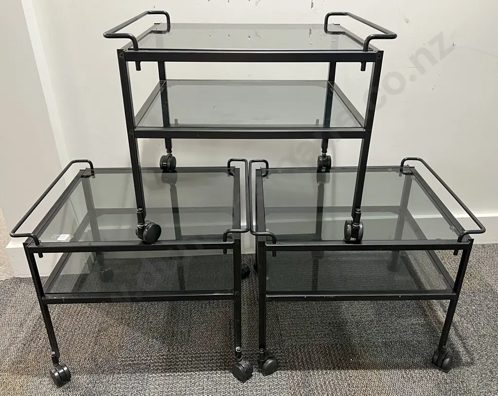 Three Modern Two Tier Glass Topped Trolleys Image 1++