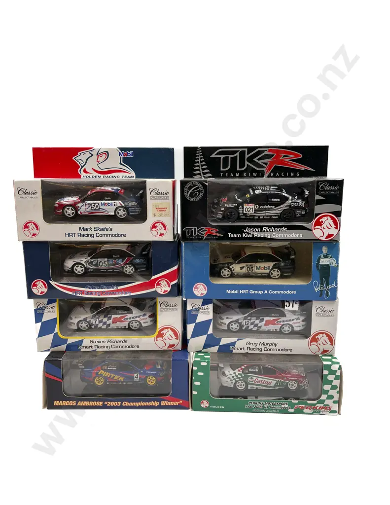 Eight Assorted Model Racing Cars Image 1++
