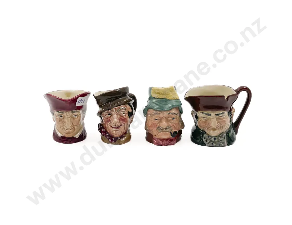Four Assorted Small Character Jugs Image 1++