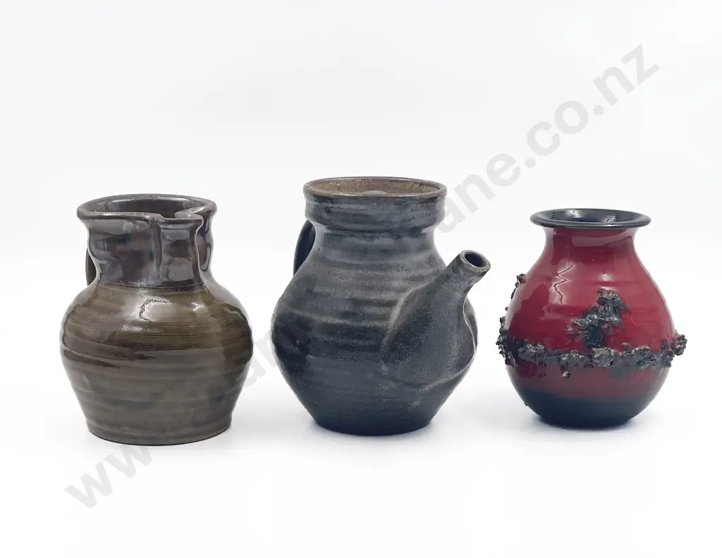 Two Marked Ceramic Vessels with Lava Form Art Glass Vase Image 1++