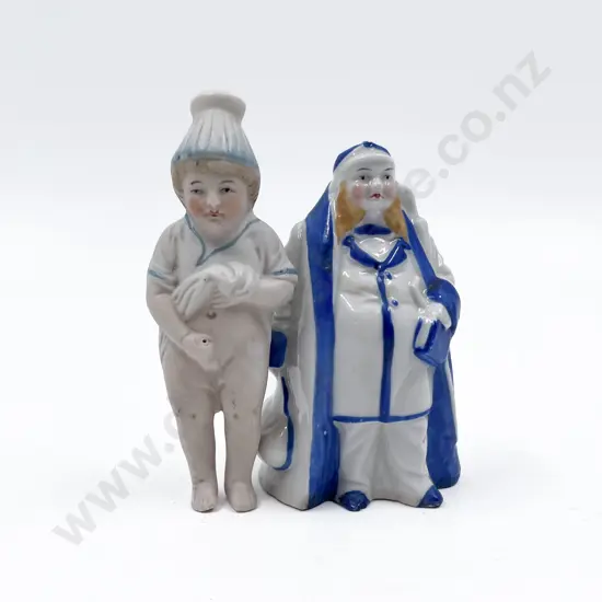 Victorian Bisque 'Pissing' Doll and Novelty Candle Snuffer
