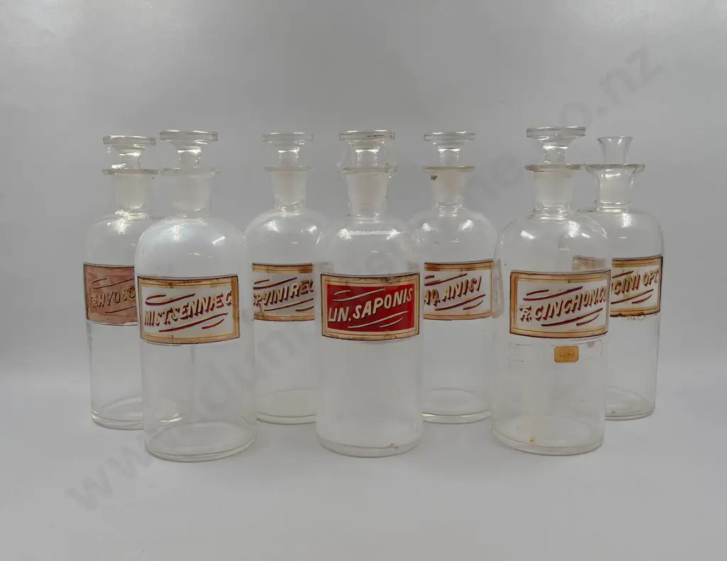 Seven Large Chemist Bottles Image 1++