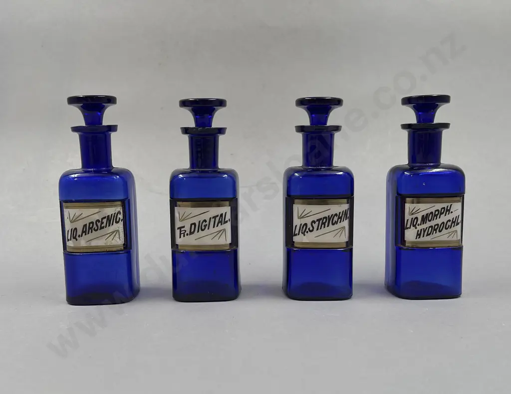 Four Blue Miniature Chemist Jars Image 1++