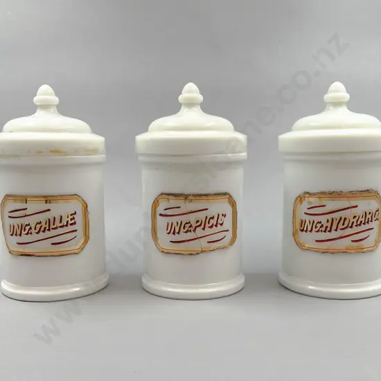 Three Large Milk Glass Chemist Lidded Jars