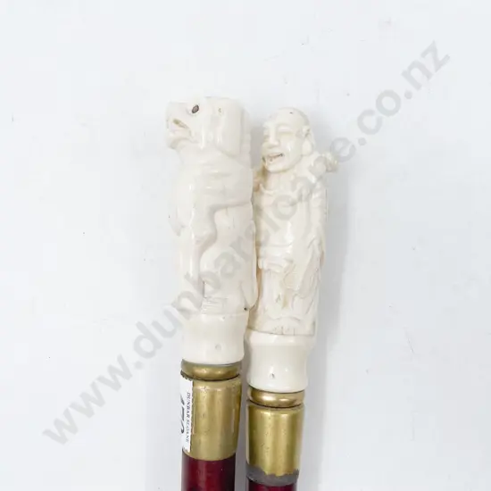 Two Modern Carved Bone Handled Walking Canes